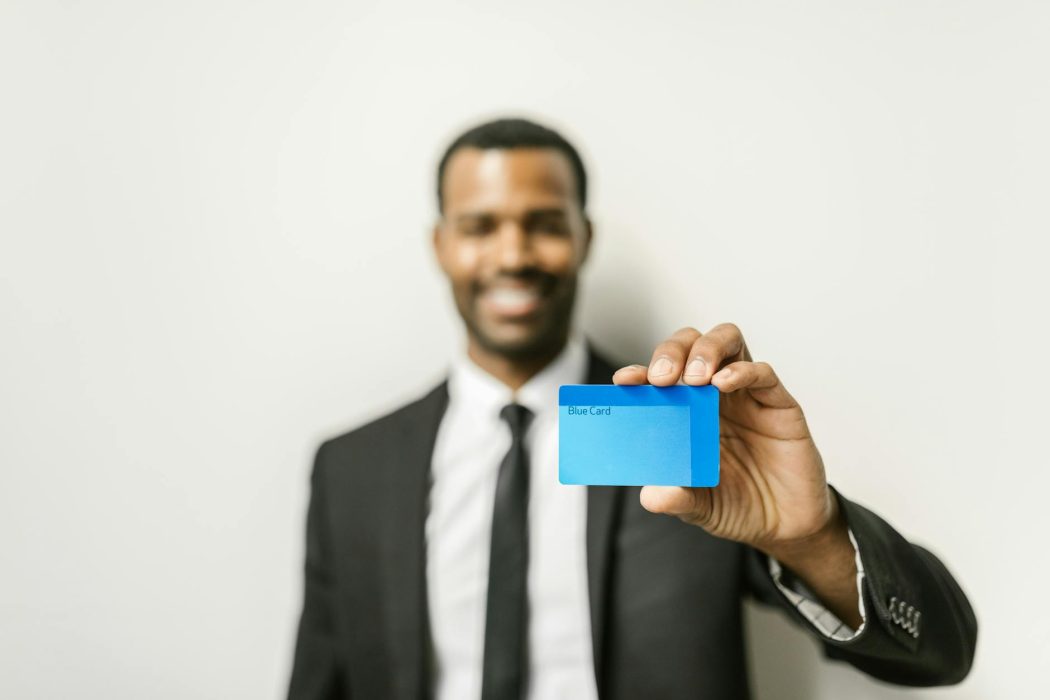 a man holding a card