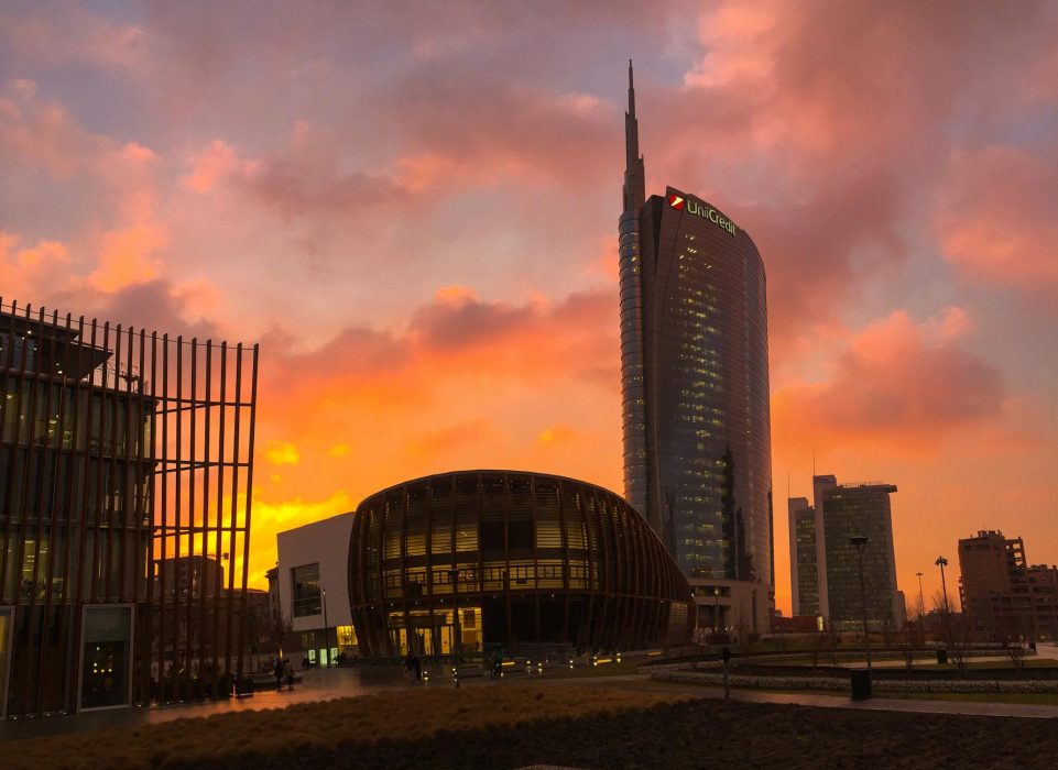buildings in a city at dusk