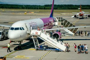 passengers boarding an airplane