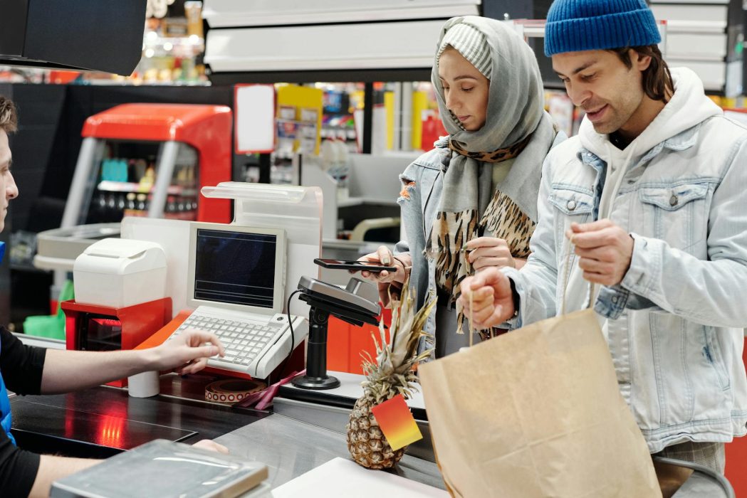 couple buying groceries at a supermarket